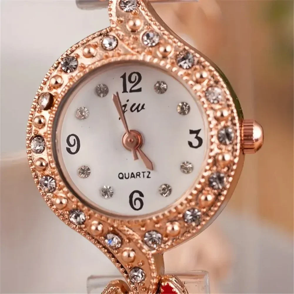Beautiful Sparkling Ladies Rose Gold Watch with Heart Design Band Stones Bling